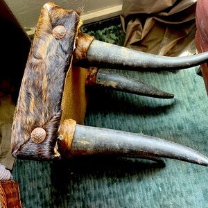 Cow hide foot stool. Handmade. No flaws practically brand new.